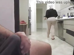 Risky jerk off while watching big ass stepmom in the kitchen.