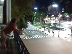 Outdoor public pissing from a balcony in America