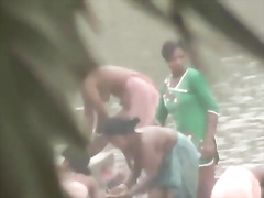 Tamil women bathing by the river