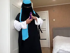 Arab wife in hijab found a sex toy while cleaning and got horny