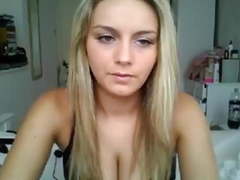 Blonde beauty strips down