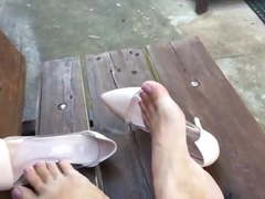 Stiletto heels and mauve toe nails